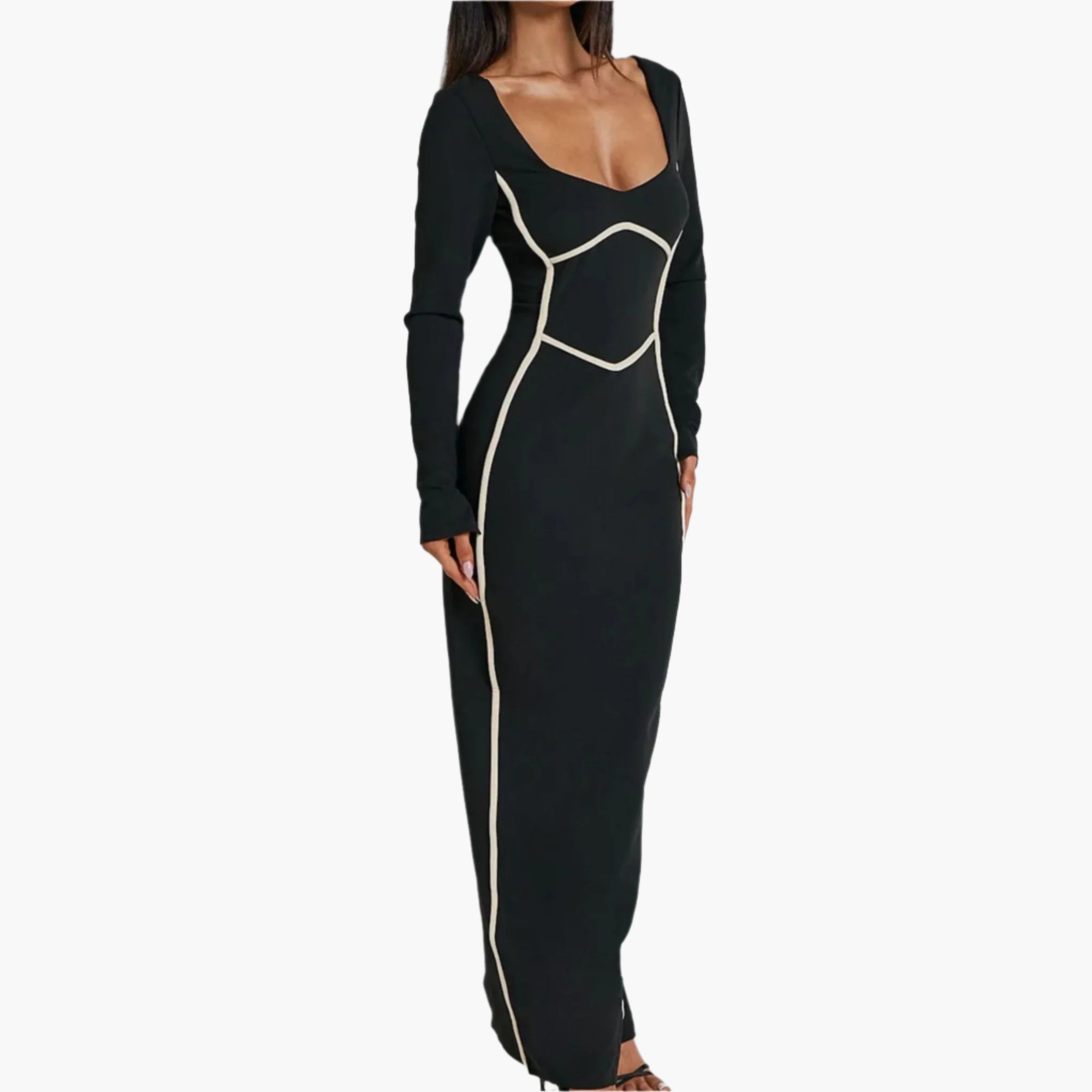 Side profile of a Black contrast-trimmed backless dress with long sleeves and flowing hem.
