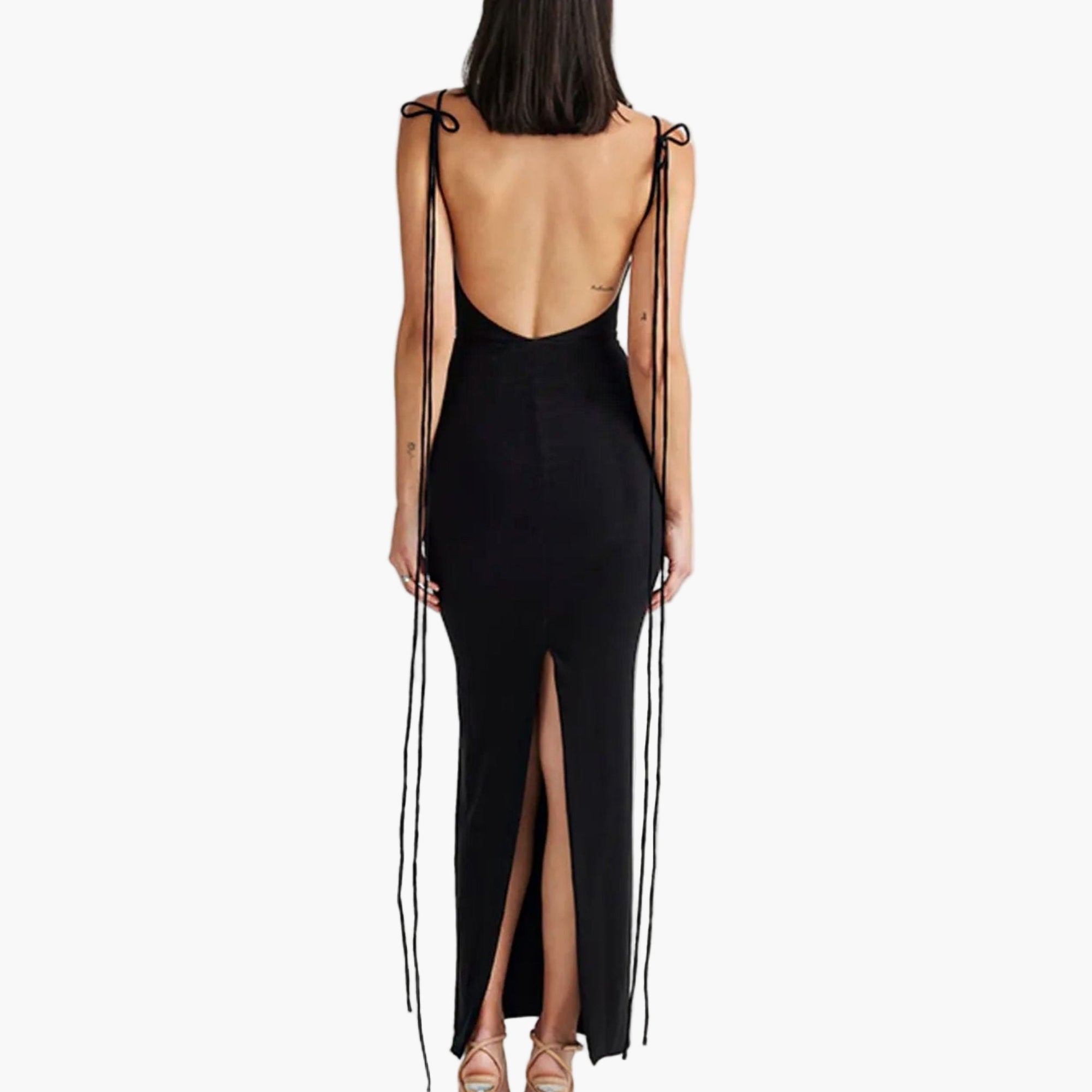 Backless Black maxi dress with tie closure and side slit, shown from behind.