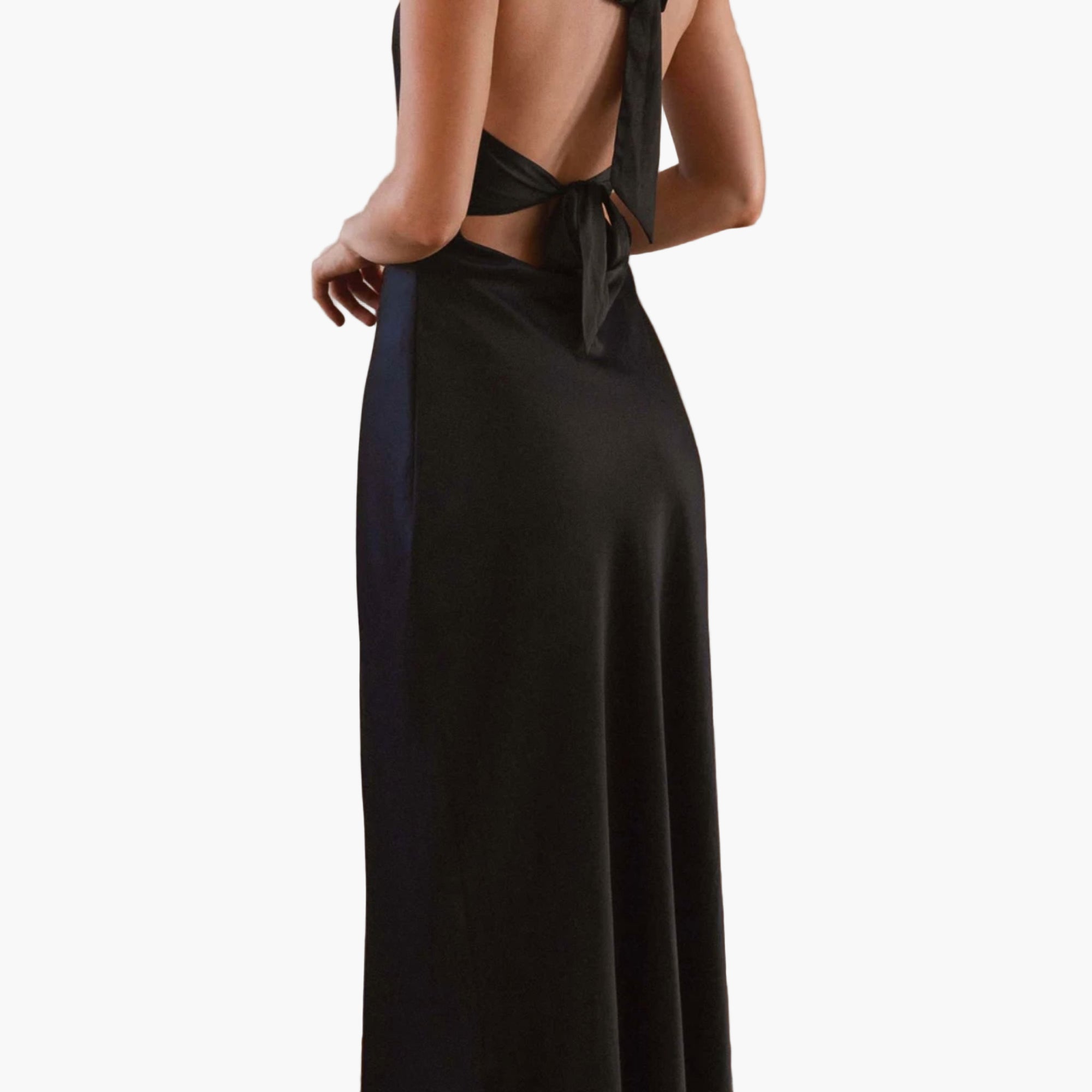 close up detail of Black dress with open back and tie detail 