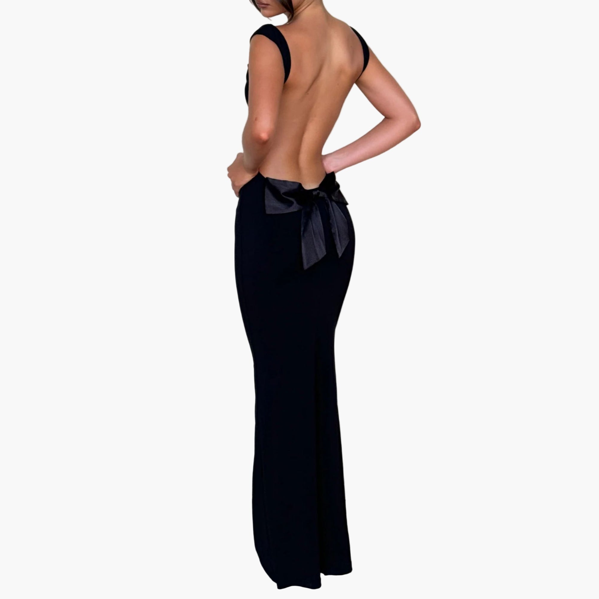 Elegant back view of bow-tie maxi dress in outdoor setting
