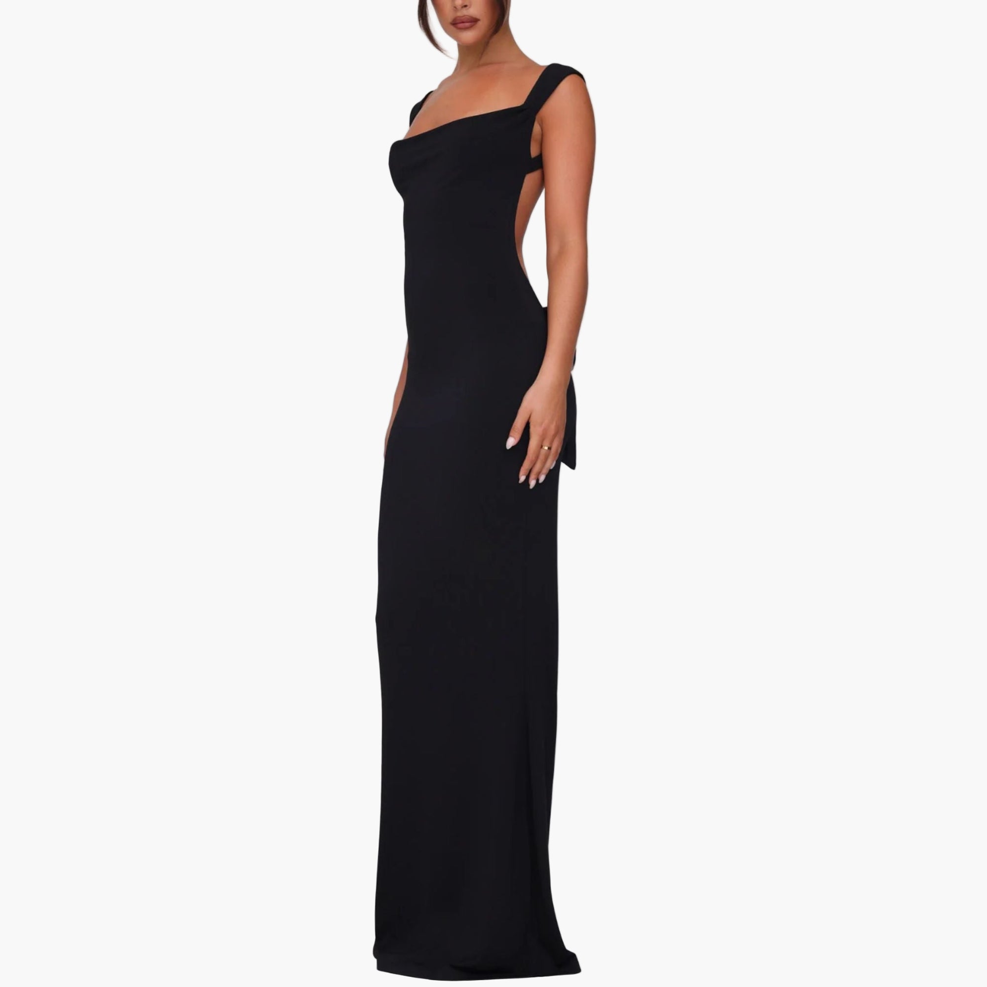 Side view showing flowy slit and form-fitting silhouette