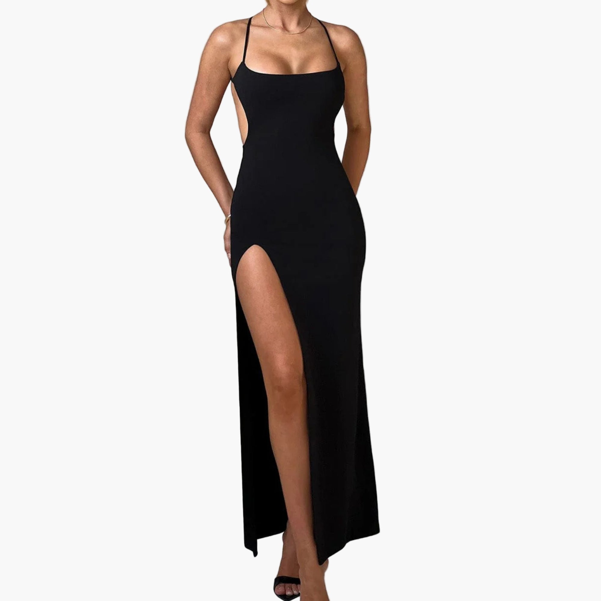 Model wearing backless slit scoop neck maxi cami dress with crisscross straps