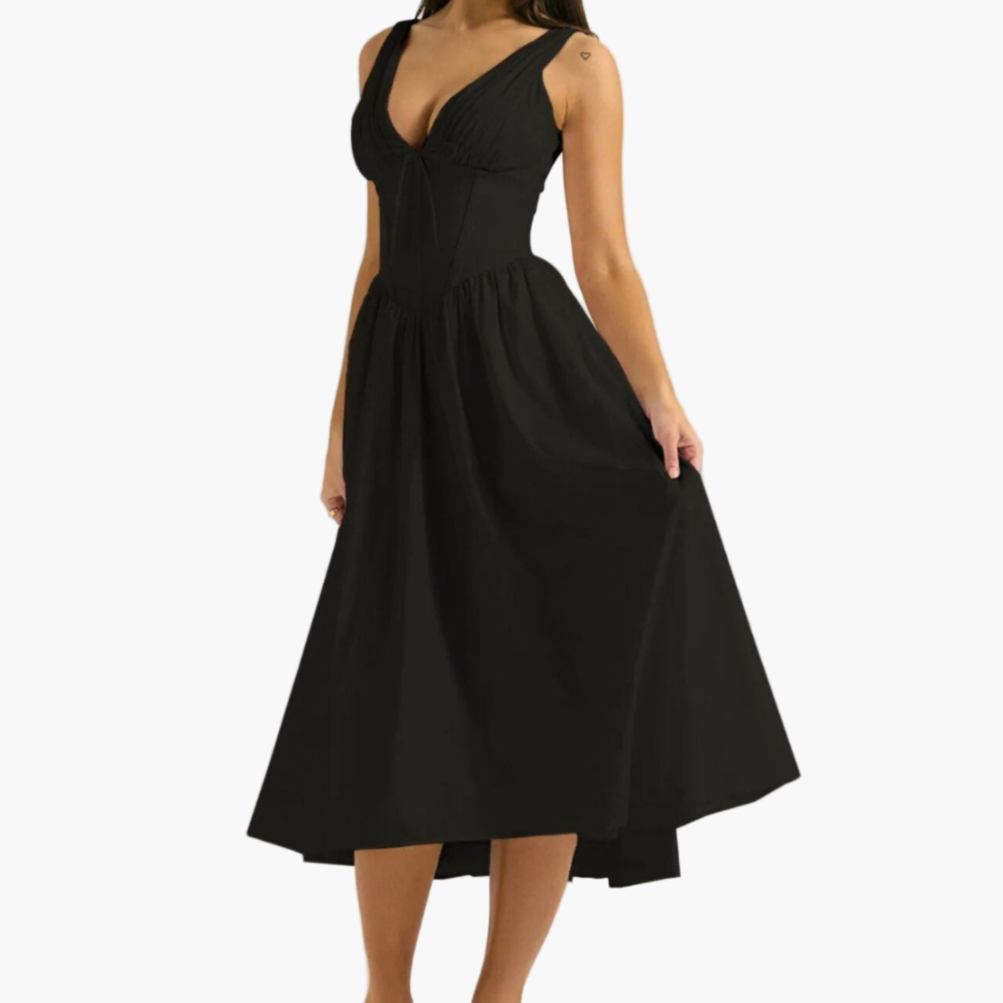 Side angle showing adjustable tie detail and flattering shape of V-neck dress