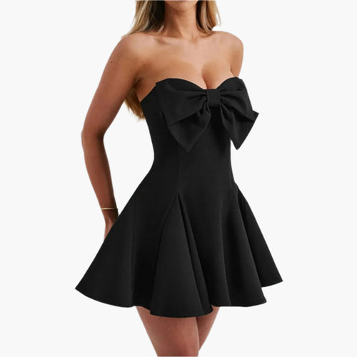 Close-up of a statement bow on a strapless black dress