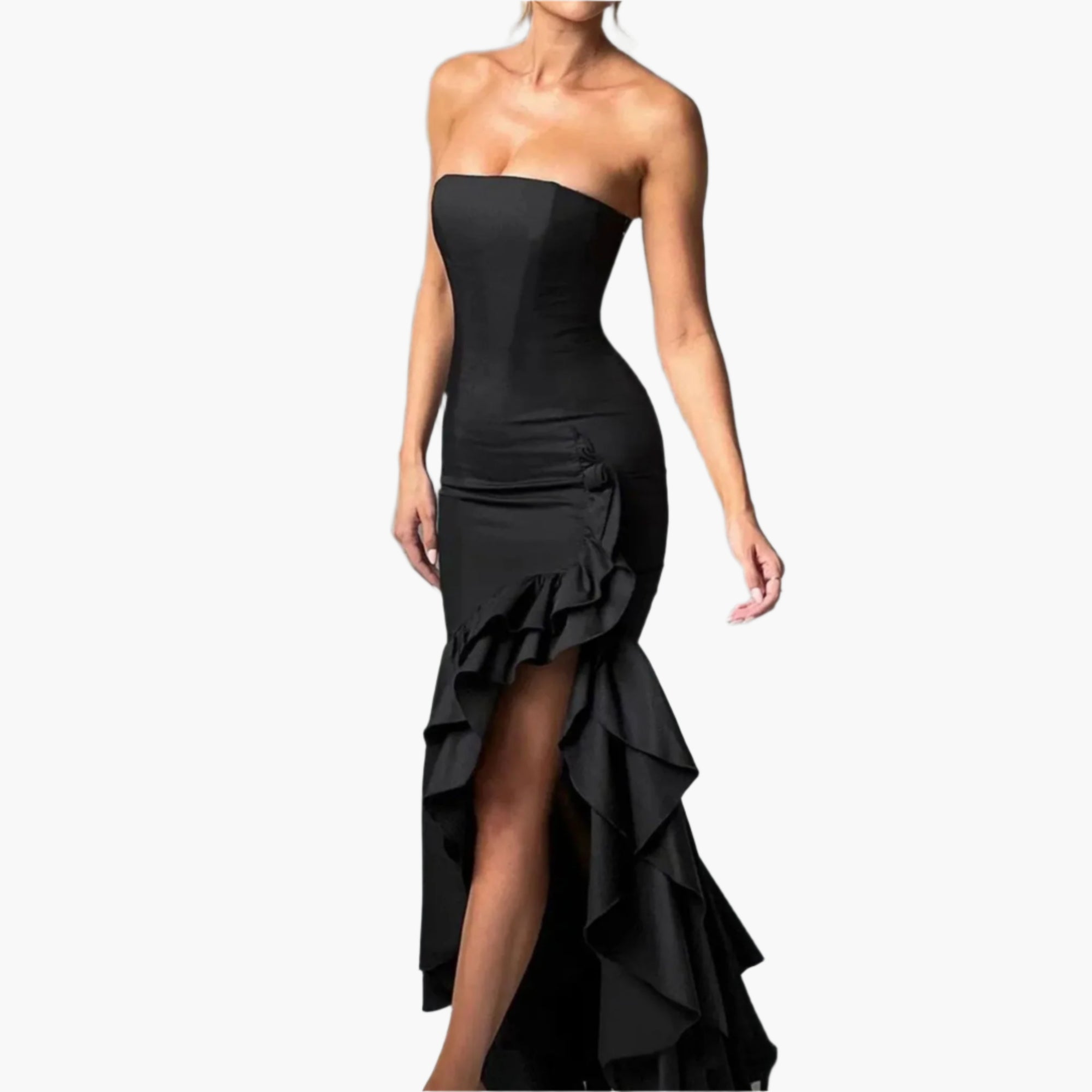 Side view of a high-low strapless dress with a front slit and flowing ruffle layers.
