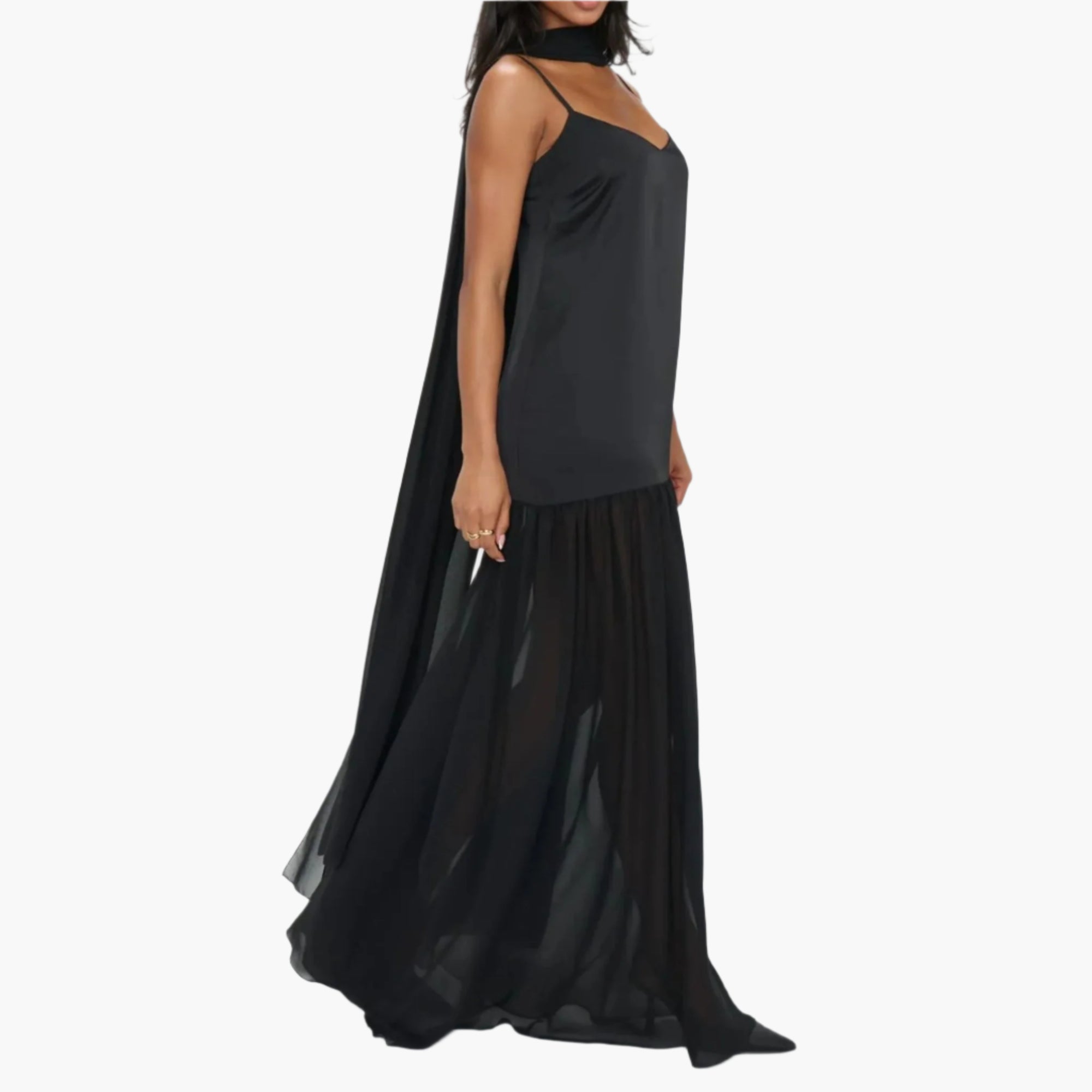 Back view of a mesh maxi dress with thin adjustable straps and flowing hem.